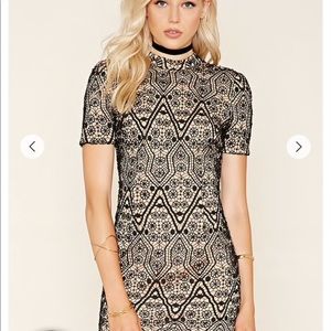NWT Black and Nude Lace Dress with Cutout in Back